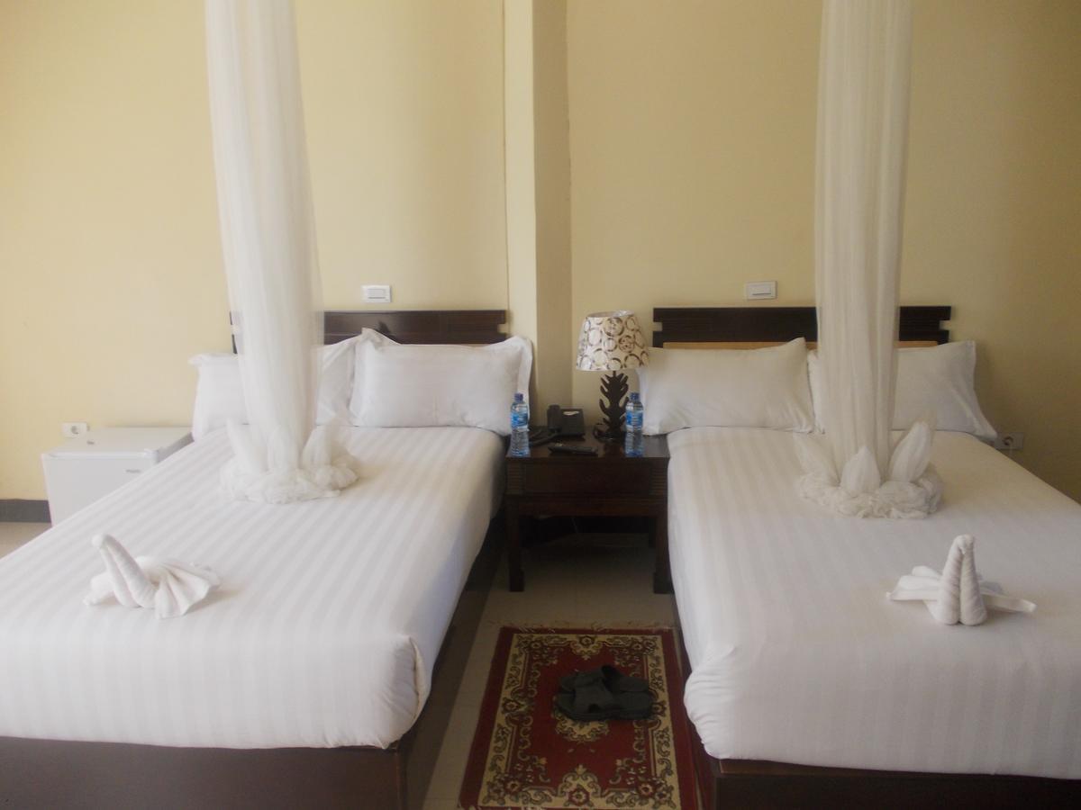 Asinuara Hotel Багір-Дар Екстер'єр фото